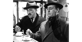 Totò, a famous Italian comedian and actor, drinking a coffee at the counter.